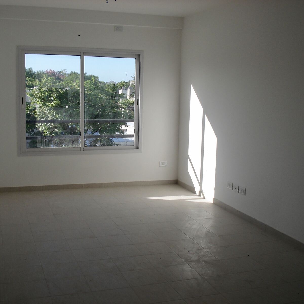 Colaboración en dúplex y edificio de dos torres — living con vista
